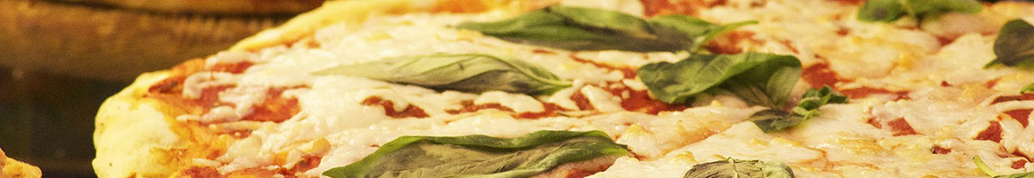 Eating Italian Pizza at Little Italy Pizza restaurant in New York, NY.